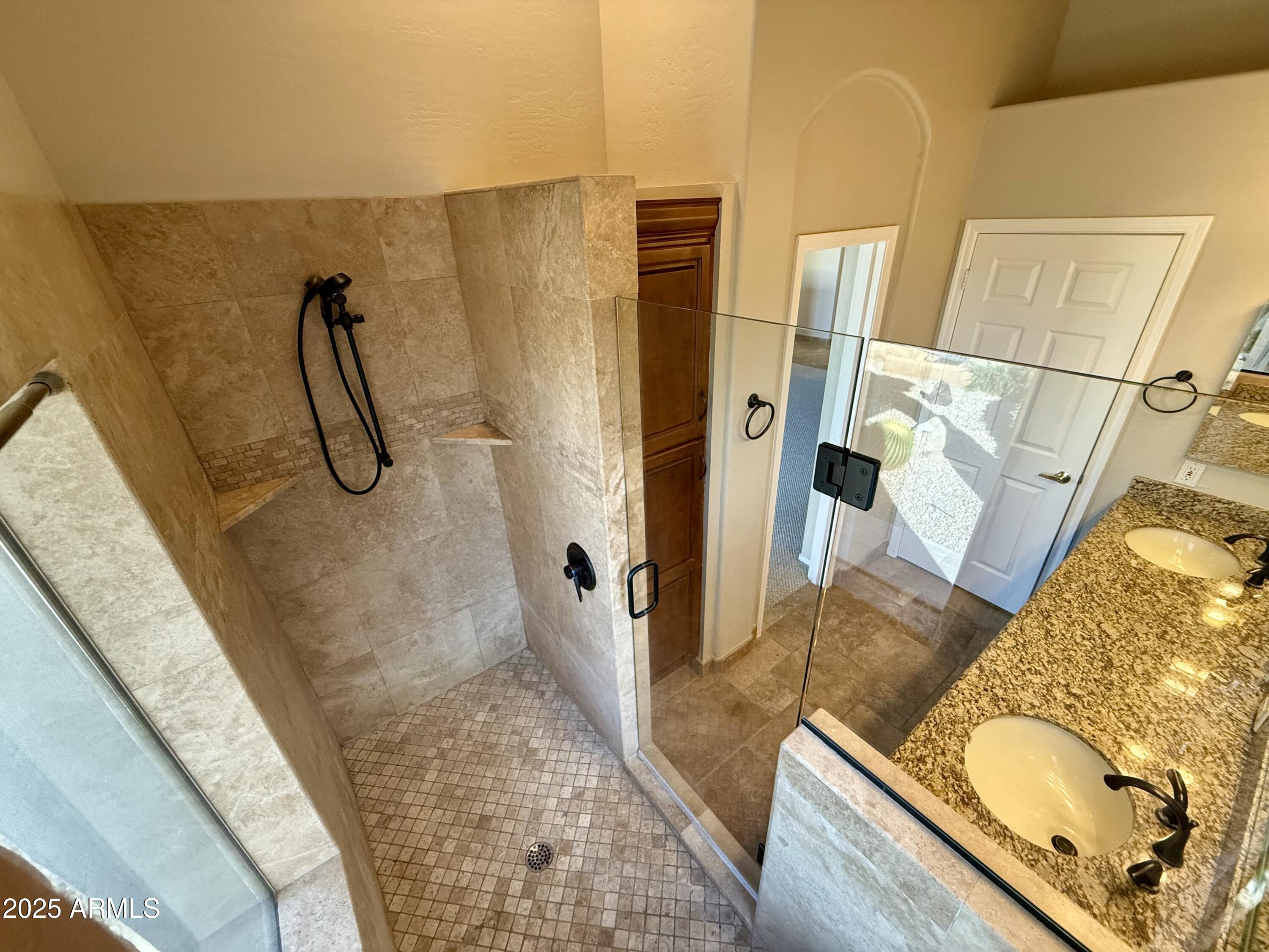 26646 North 148th Street Scottsdale, AZ 85262 - Photo 14 of 37 a bathroom with a granite countertop shower a sink and a mirror