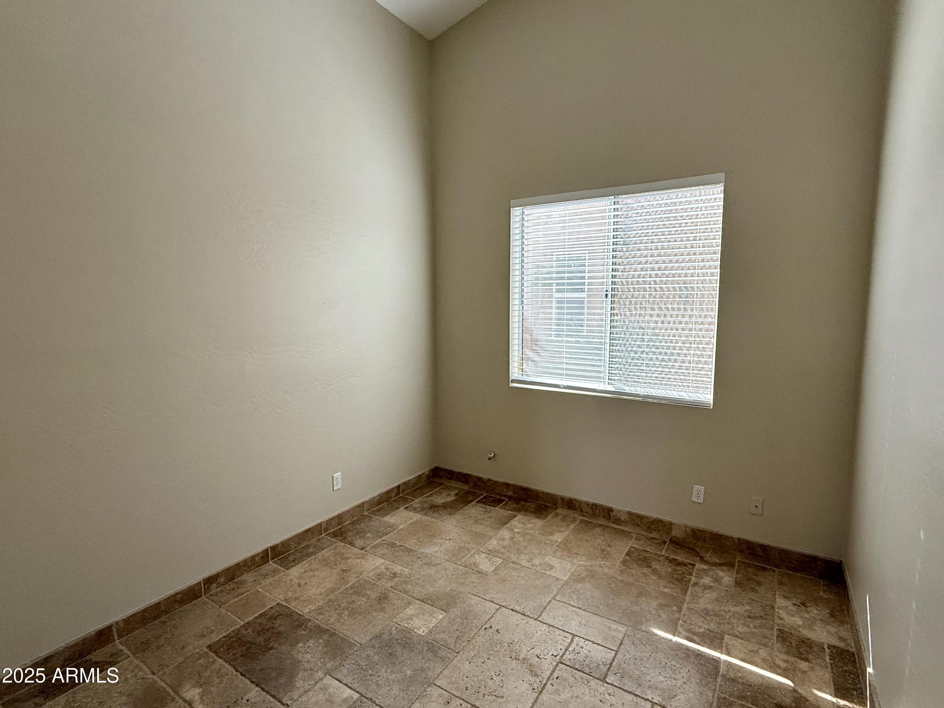 26646 North 148th Street Scottsdale, AZ 85262 - Photo 18 of 37 a view of an empty room with a window