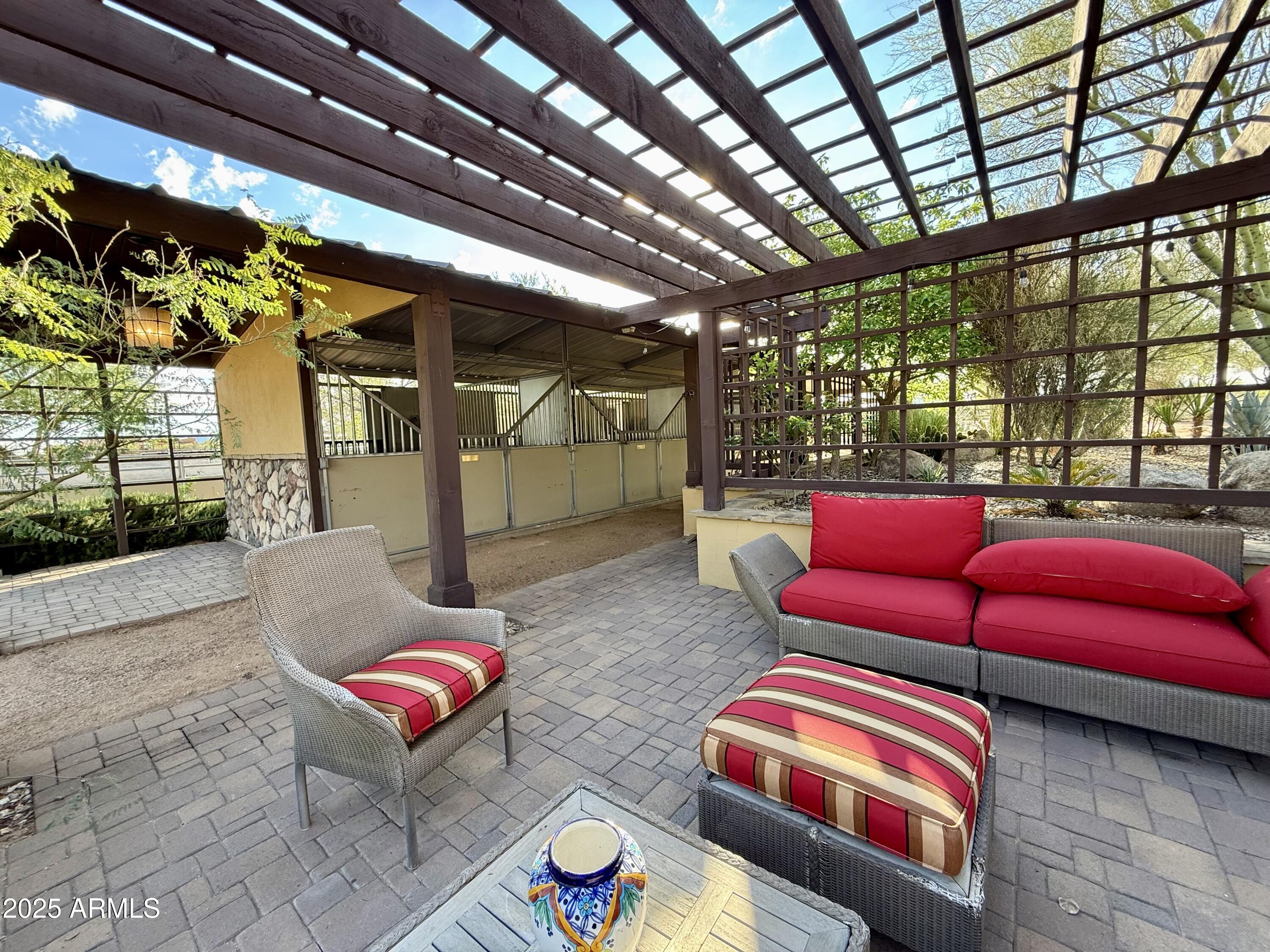 26646 North 148th Street Scottsdale, AZ 85262 - Photo 29 of 37 a backyard with furniture a rug and a chandelier