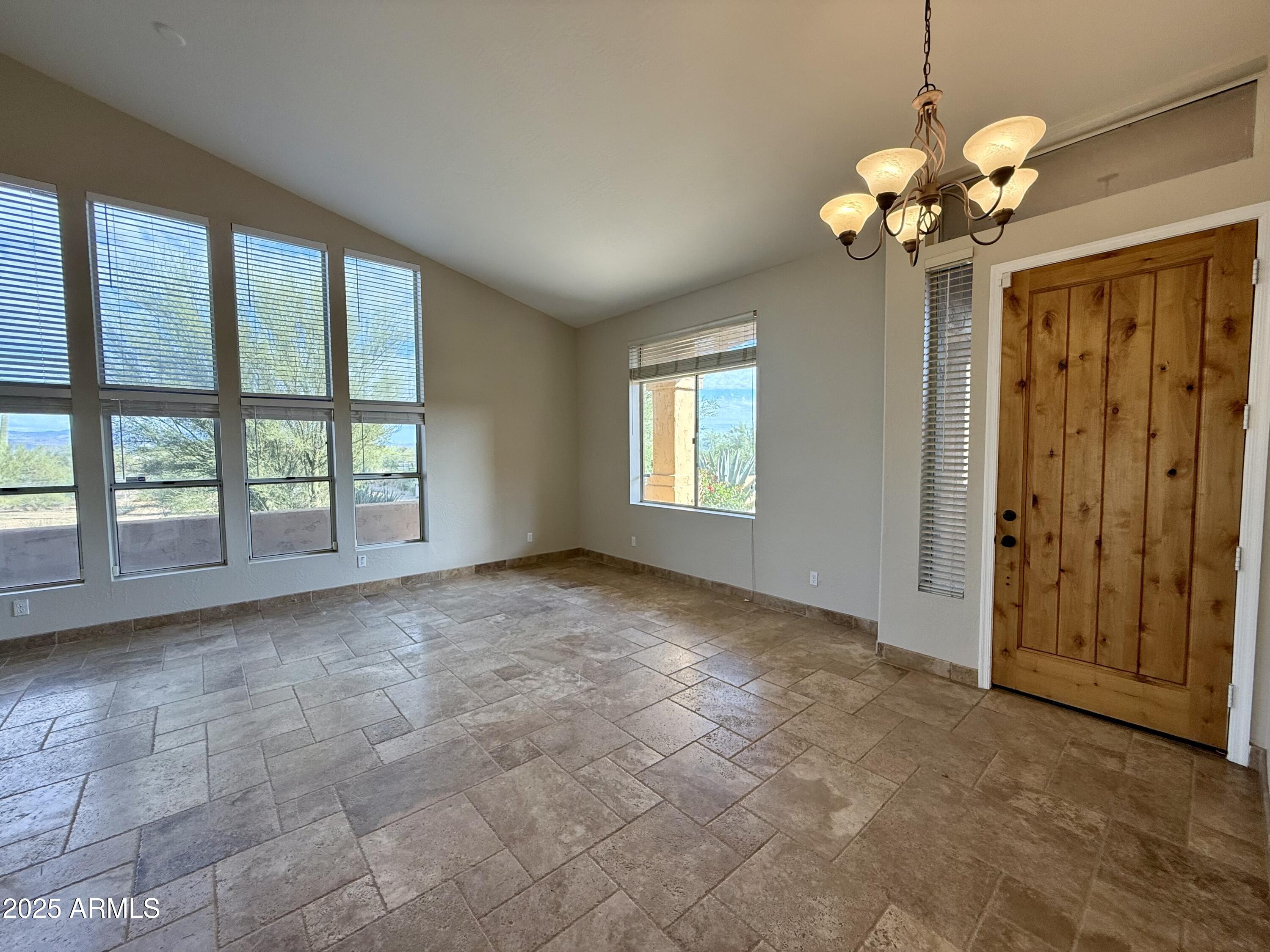 26646 North 148th Street Scottsdale, AZ 85262 - Photo 7 of 37 a view of an empty room with a window