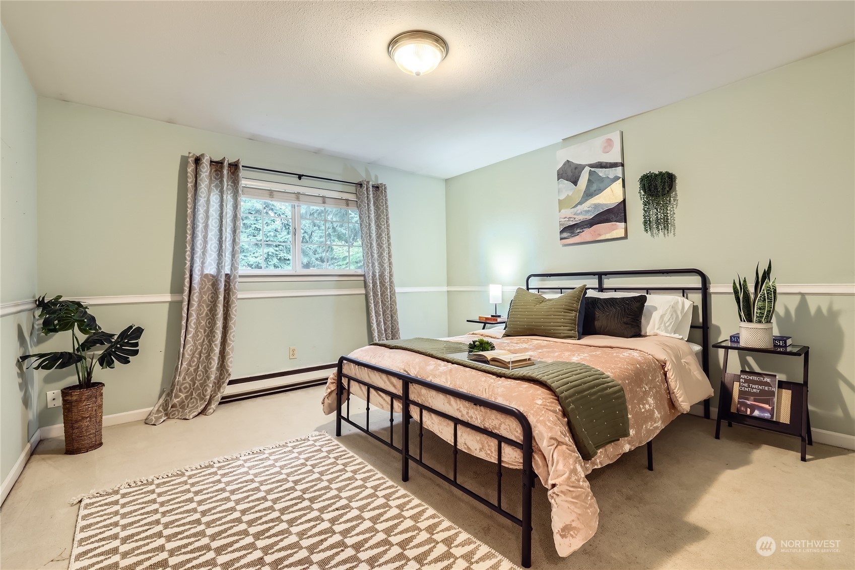 1121 204th Place Southeast Bothell, WA 98012 - Photo 21 of 28 a bedroom with a bed and wooden floor