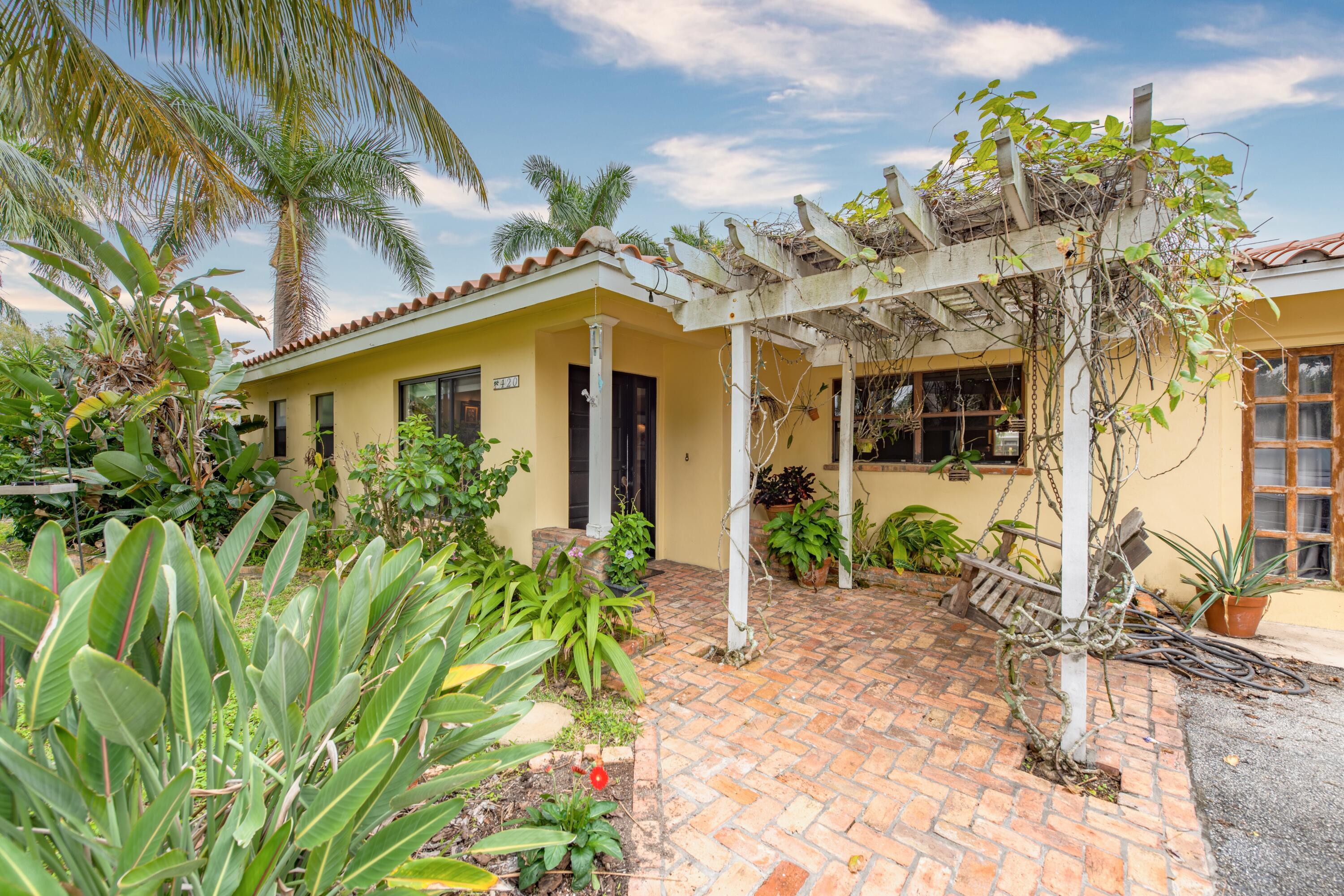420 Northeast 36th Street Boca Raton, FL 33431 - Photo 3 of 42 Front of Home 1