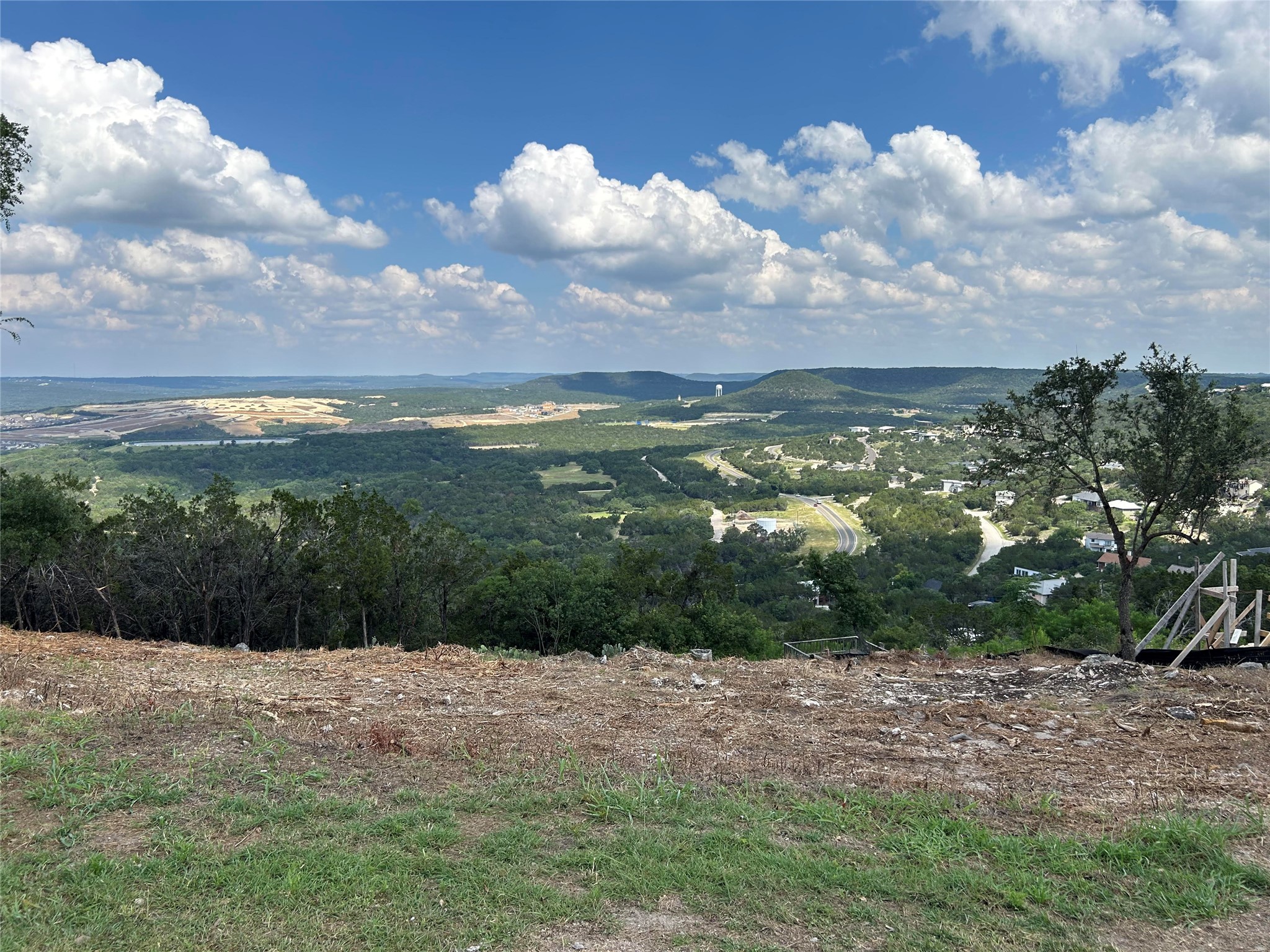 8224 Bar K Ranch Road Lago Vista, TX 78645 - Photo 6 of 25 Standing on the edge of the road, looking towards the lot and the amazing views!