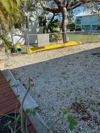 a view of a swimming pool with a lounge chairs
