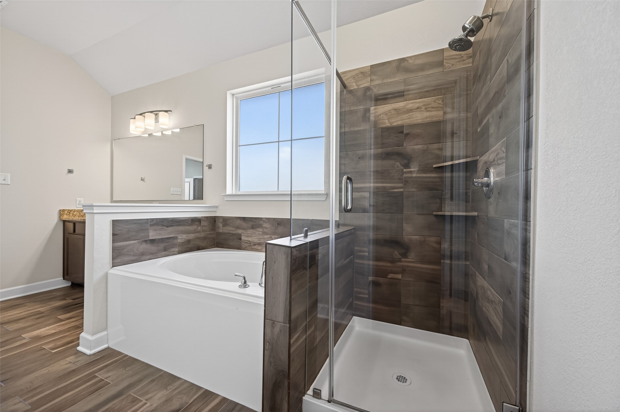 917 Farm Path Brenham, TX 77833 - Photo 25 of 43 a bathroom with a shower and sink