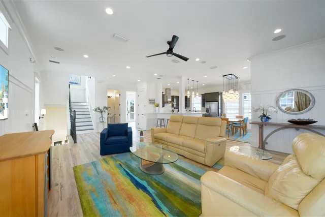 a bedroom with a large bed and a tv