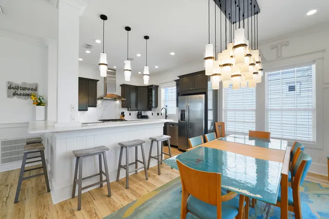 a bedroom with a bed and a television