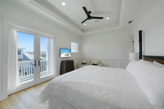 a aerial view of a house with swimming pool and sitting area