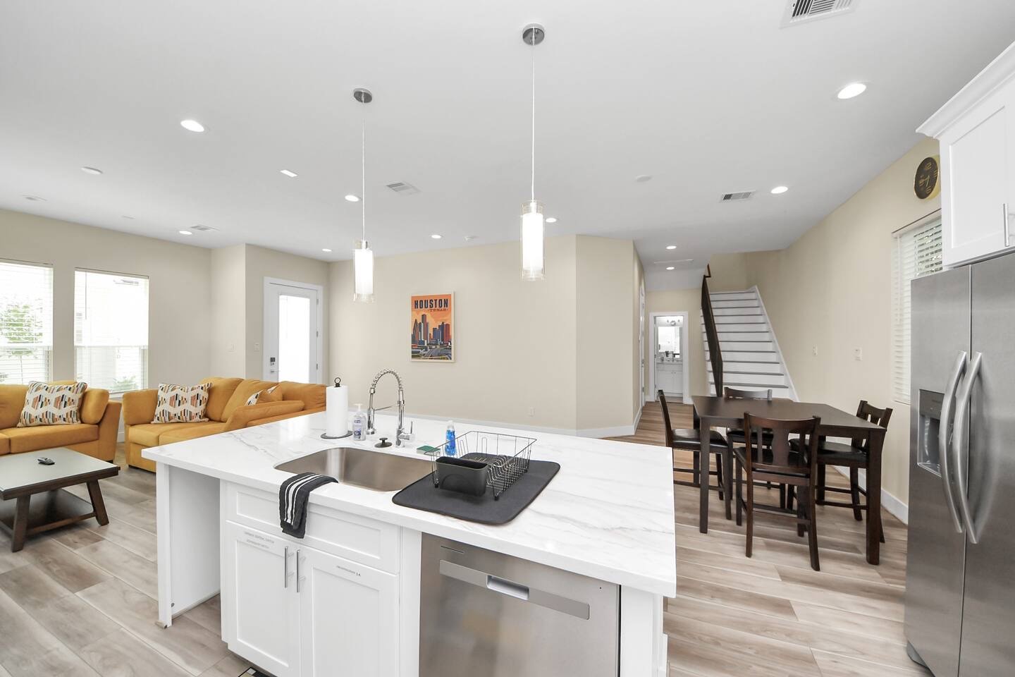 5935 Beall Street, Unit B Houston, TX 77091 - Photo 12 of 50 an open kitchen with a table and chairs