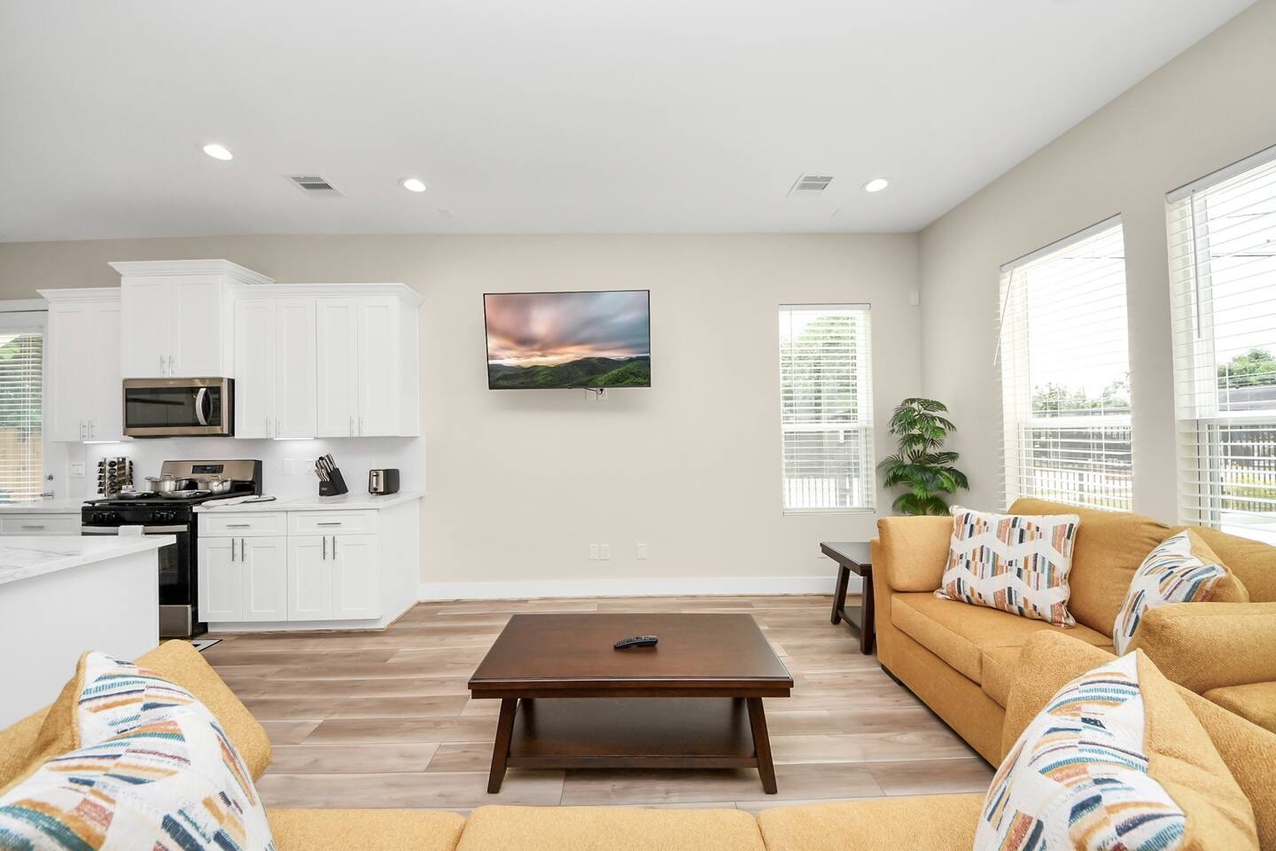 5935 Beall Street, Unit B Houston, TX 77091 - Photo 19 of 50 a living room with furniture and a flat screen tv