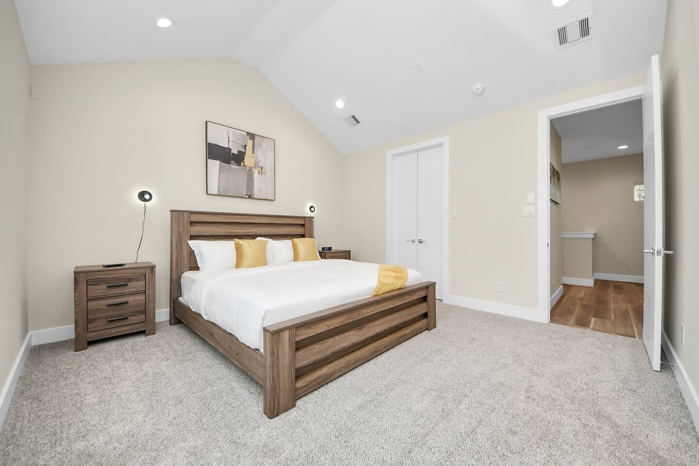 5935 Beall Street, Unit B Houston, TX 77091 - Photo 26 of 50 a bedroom with a bed and a couch