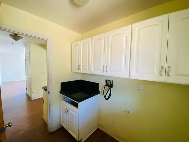 a bathroom with a sink and a window