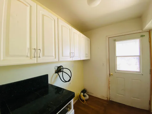 a bathroom with a sink and a window