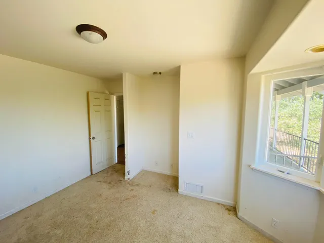 an empty room with windows