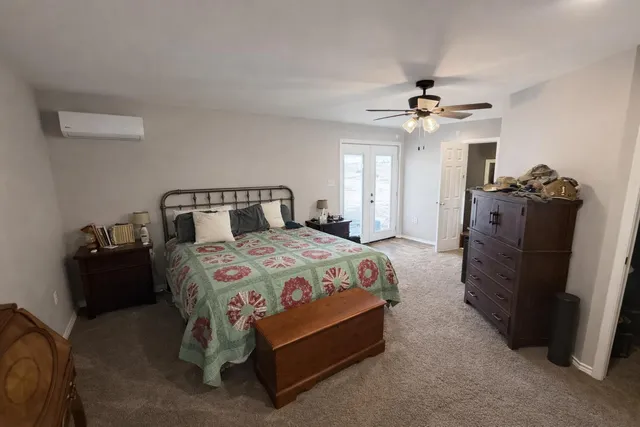a bathroom with a sink toilet and mirror