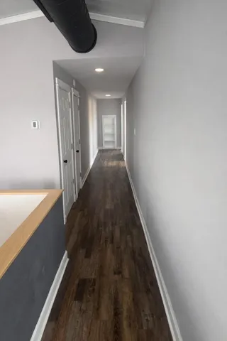 a bed room with a bed and a window