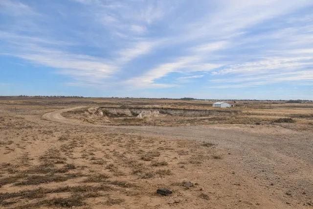 a view of an ocean beach and city