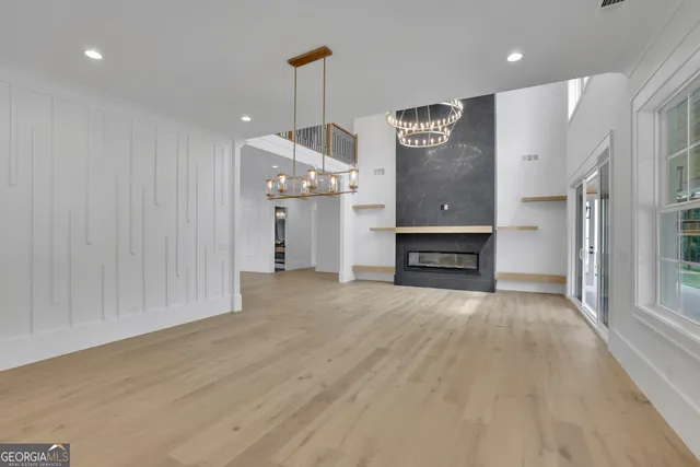a bathroom with a sink vanity and mirror