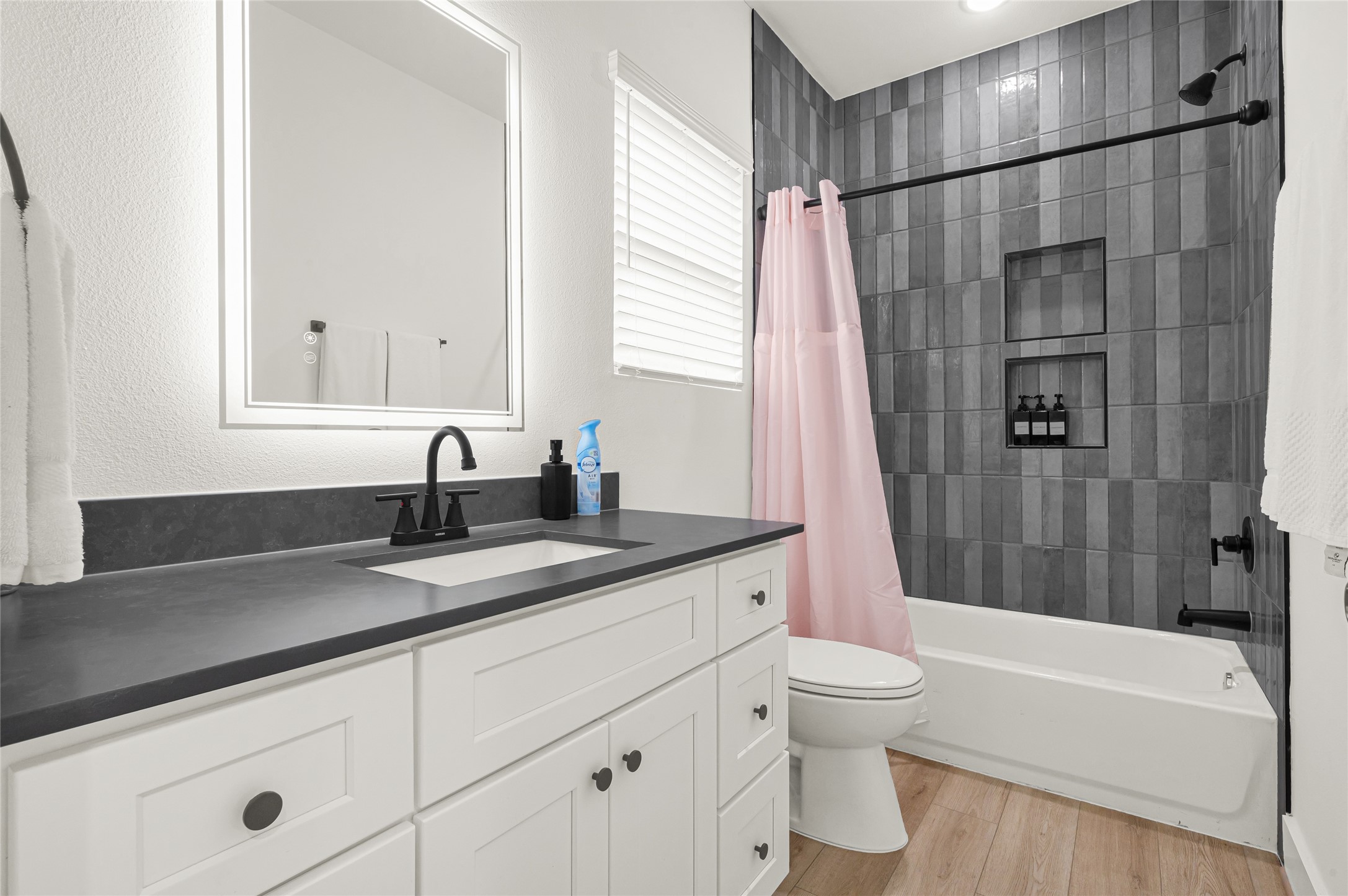 4201 Stassen Street Houston, TX 77051 - Photo 29 of 39 a bathroom with a granite countertop sink toilet and shower