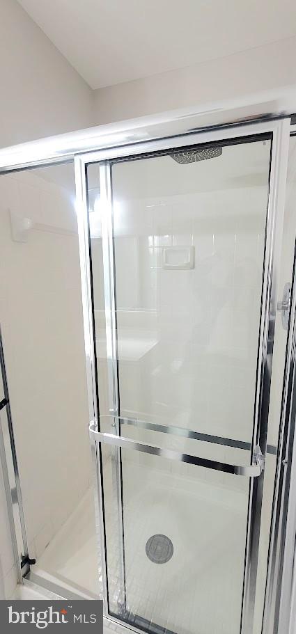 12 Sebastiani Boulevard Gaithersburg, MD 20878 - Photo 11 of 21 Sleek modern shower with glass enclosure.