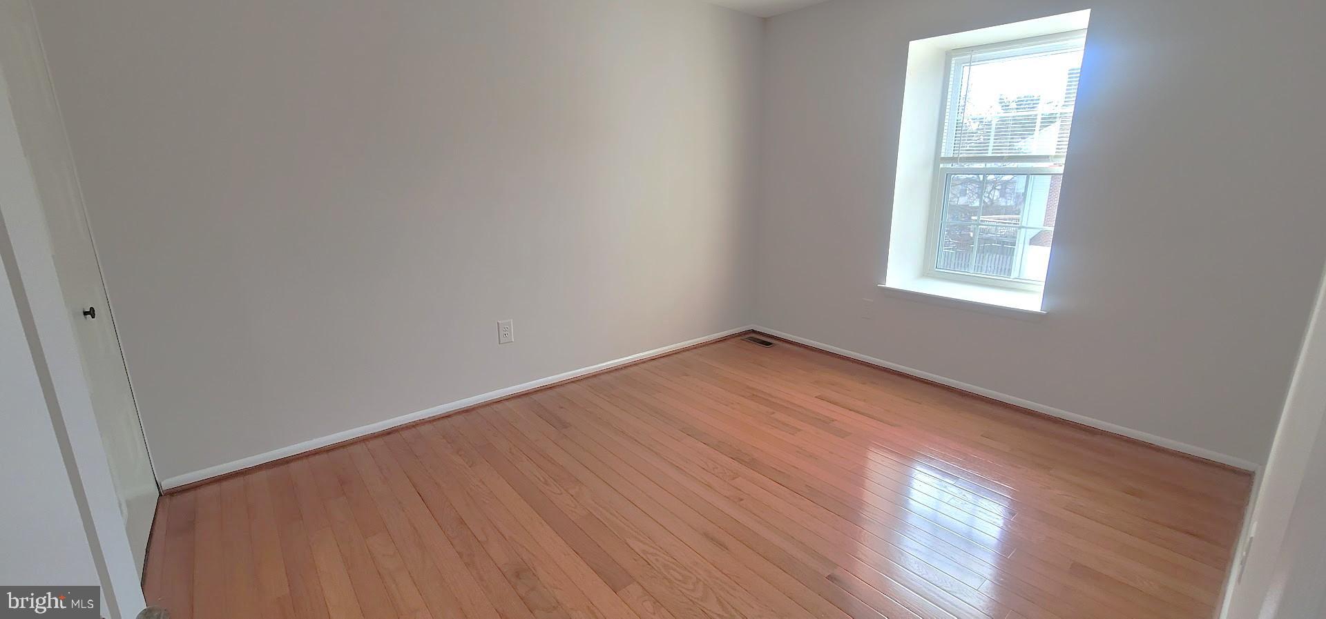 12 Sebastiani Boulevard Gaithersburg, MD 20878 - Photo 13 of 21 Bright and airy room with hardwood floors.