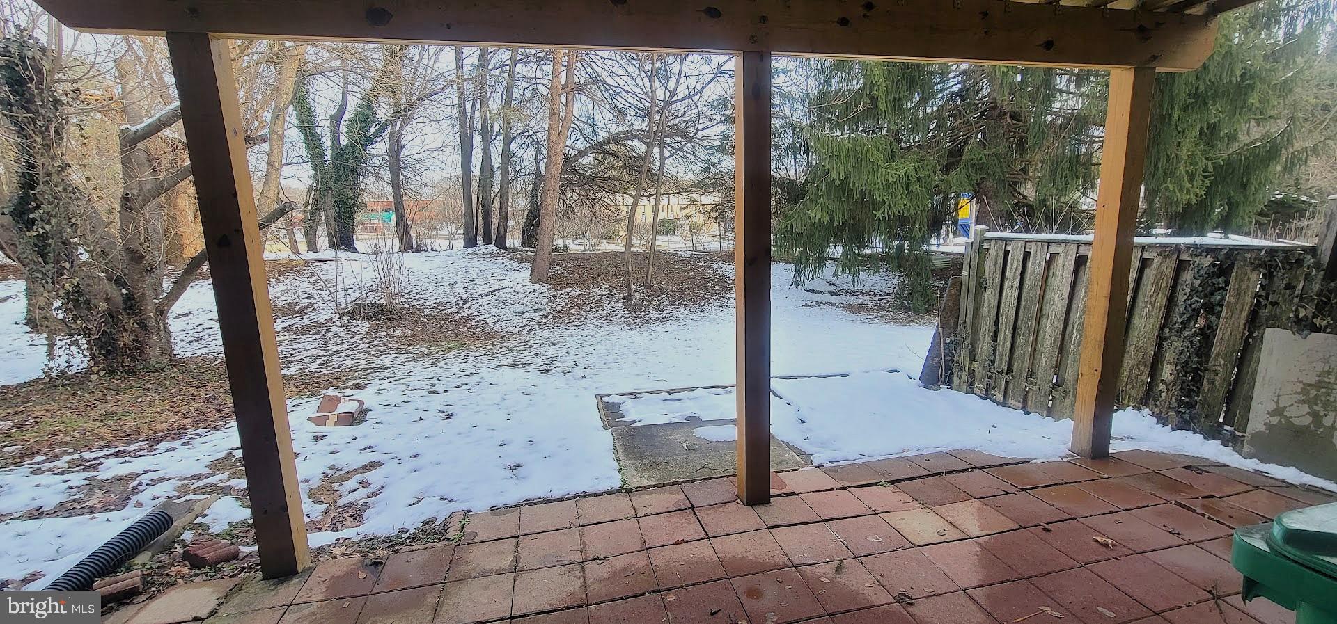 12 Sebastiani Boulevard Gaithersburg, MD 20878 - Photo 17 of 21 Serene winter view from a cozy patio.