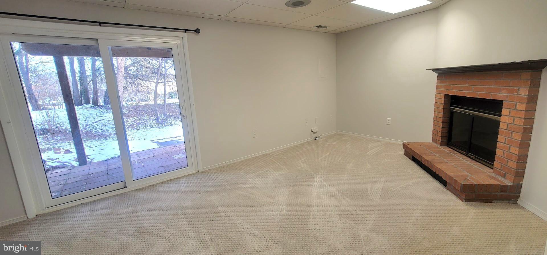 12 Sebastiani Boulevard Gaithersburg, MD 20878 - Photo 18 of 21 Cozy space with natural light and outdoor view.