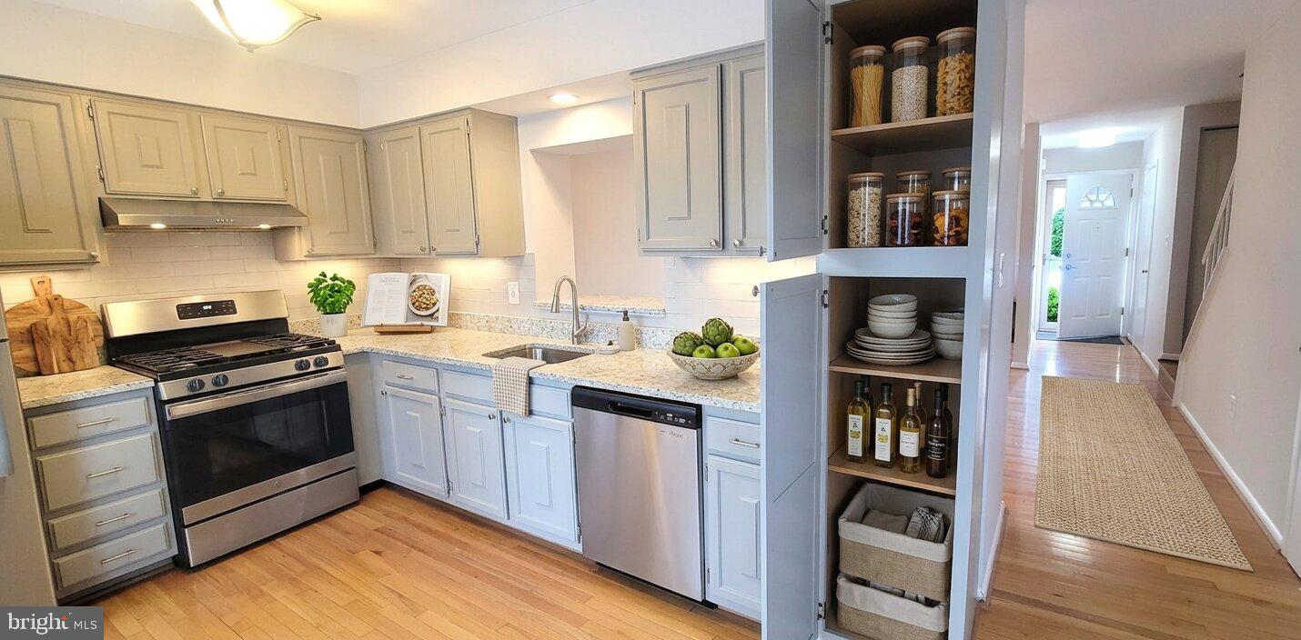 12 Sebastiani Boulevard Gaithersburg, MD 20878 - Photo 5 of 21 Modern kitchen with sleek design.
