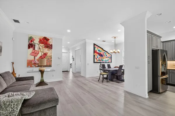 a bathroom with a window and a shower