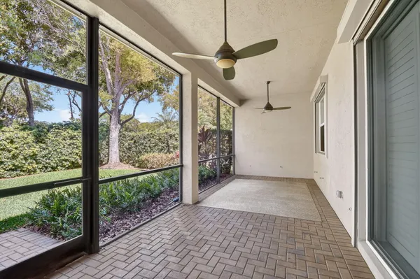 a living room with furniture or couch and a large window