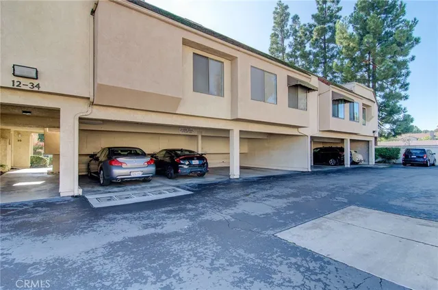 a view of a car in front of house