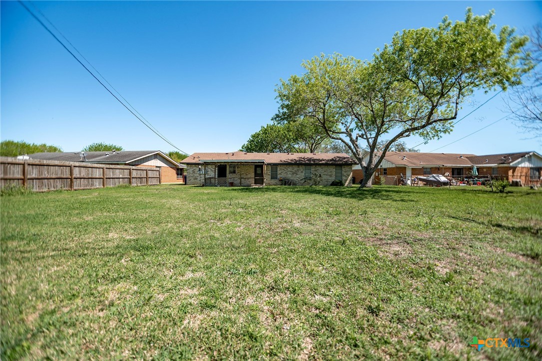 525 Travis Street Port Lavaca, TX 77979 - Photo 21 of 24 a view of a house with a yard