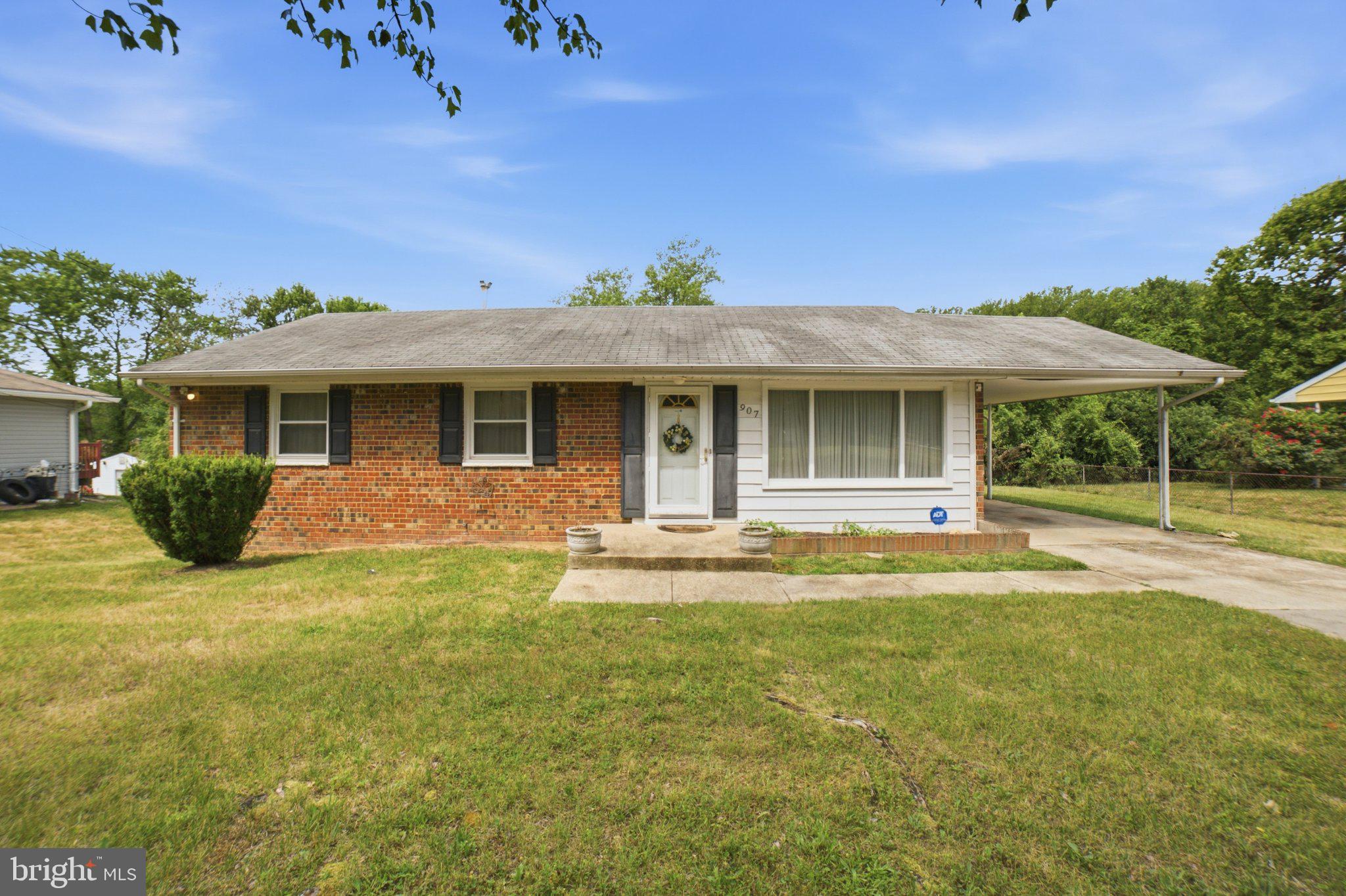 907 Logwood Road Capitol Heights, MD 20743 - Photo 1 of 16 Charming brick home with lush greenery.