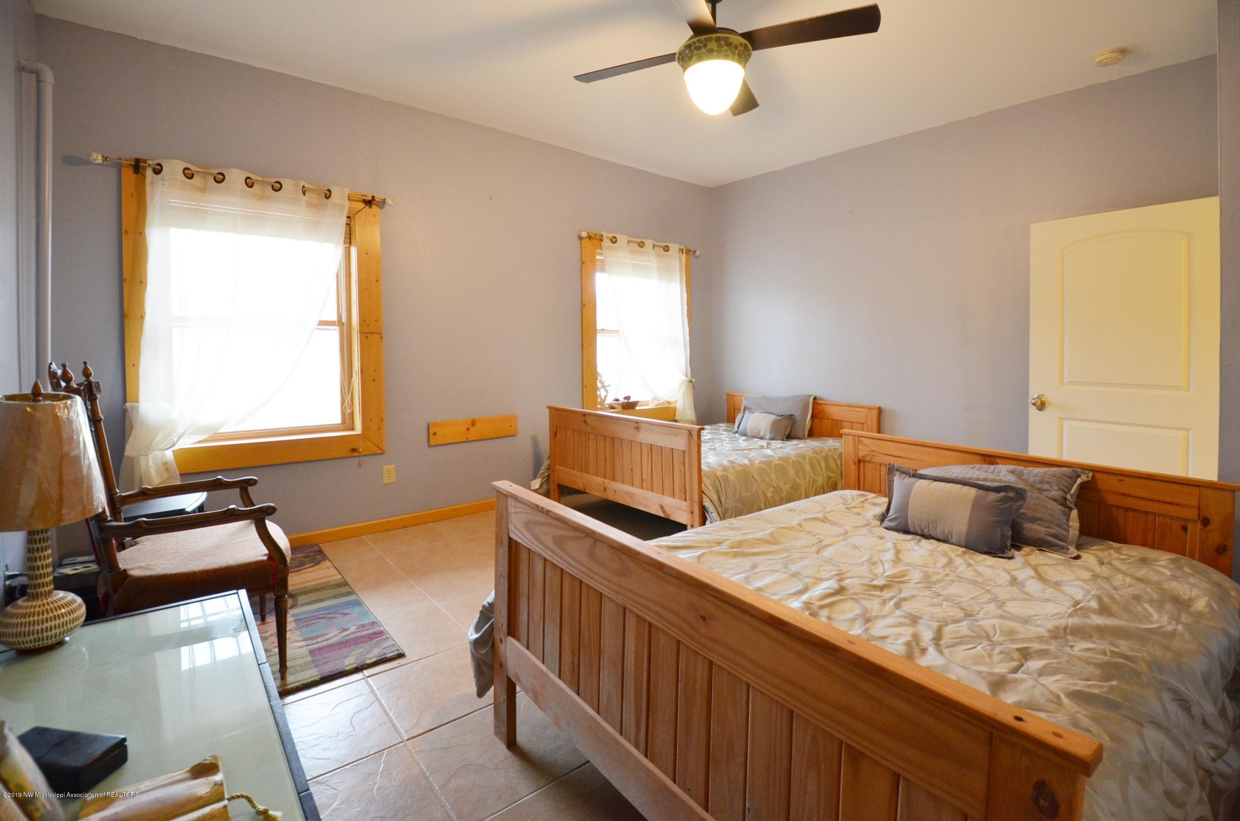 9586 Arkabutla Road Coldwater, MS 38618 - Photo 23 of 32 Basement Bedroom