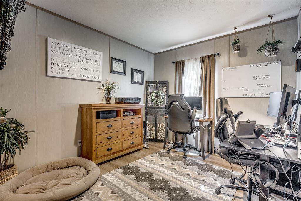 344 Hometown Way Springtown, TX 76082 - Photo 11 of 13 a view of workspace with furniture and window