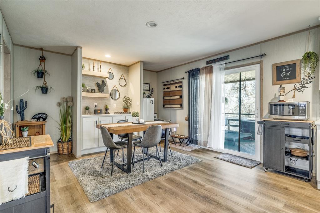 344 Hometown Way Springtown, TX 76082 - Photo 4 of 13 a dining room with furniture and window