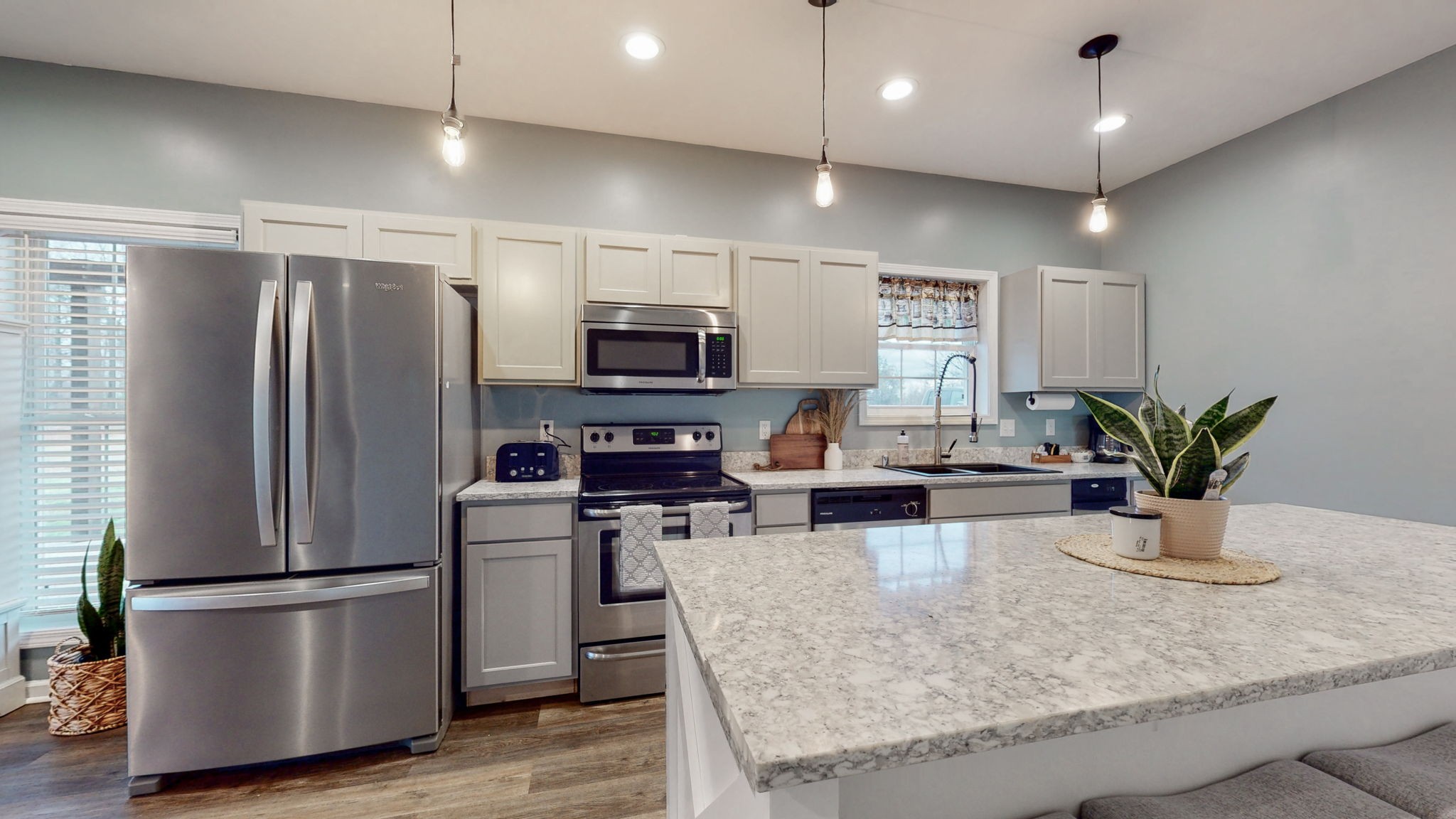 5273 Zander Road Hopkinsville, KY 42240 - Photo 19 of 75 a kitchen with sink a refrigerator and chairs