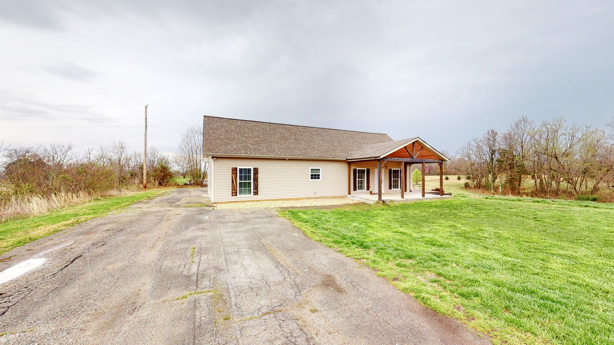 5273 Zander Road Hopkinsville, KY 42240 - Photo 36 of 75 a front view of house with yard and green space