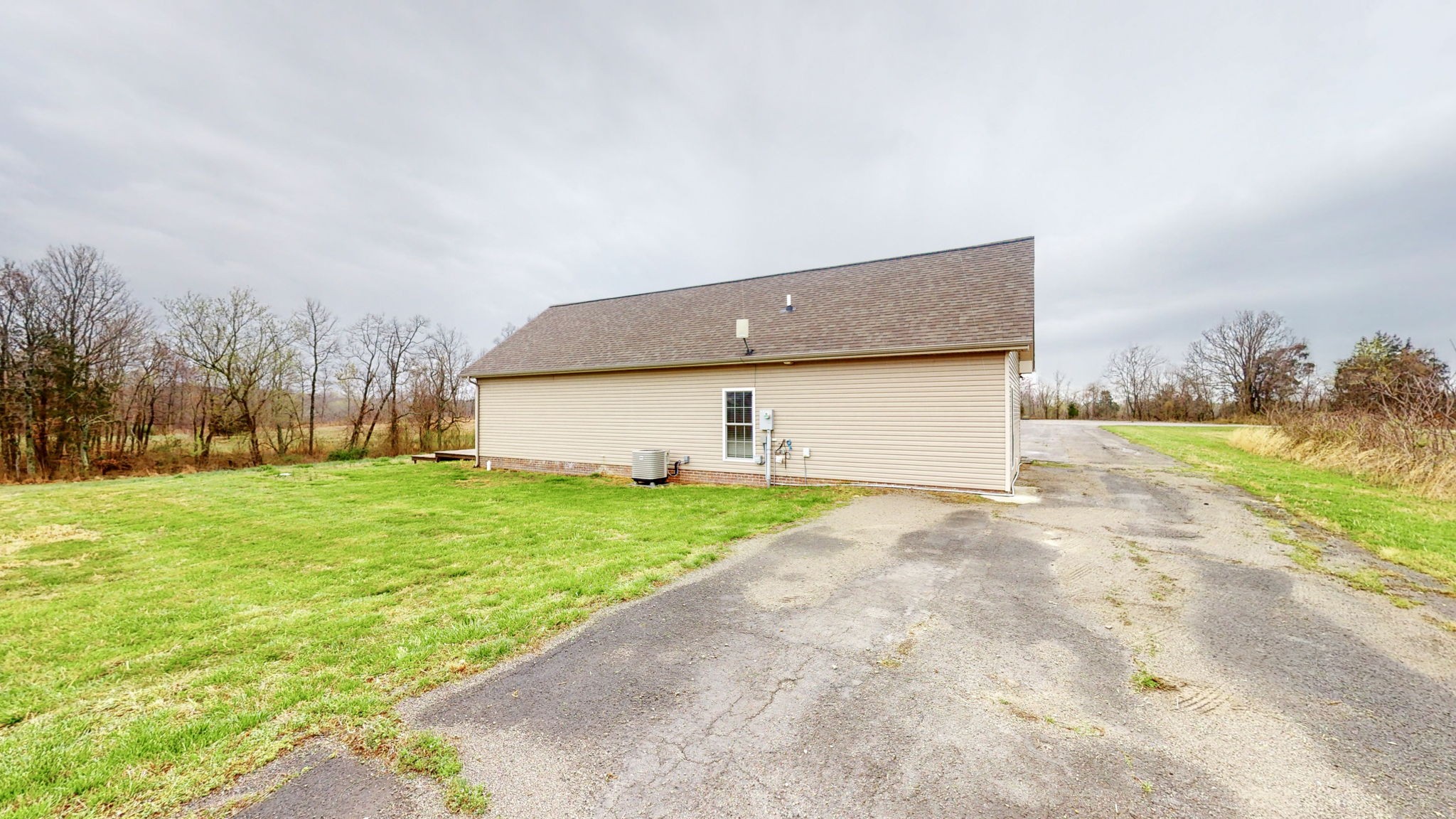 5273 Zander Road Hopkinsville, KY 42240 - Photo 45 of 75 a front view of house with yard and trees