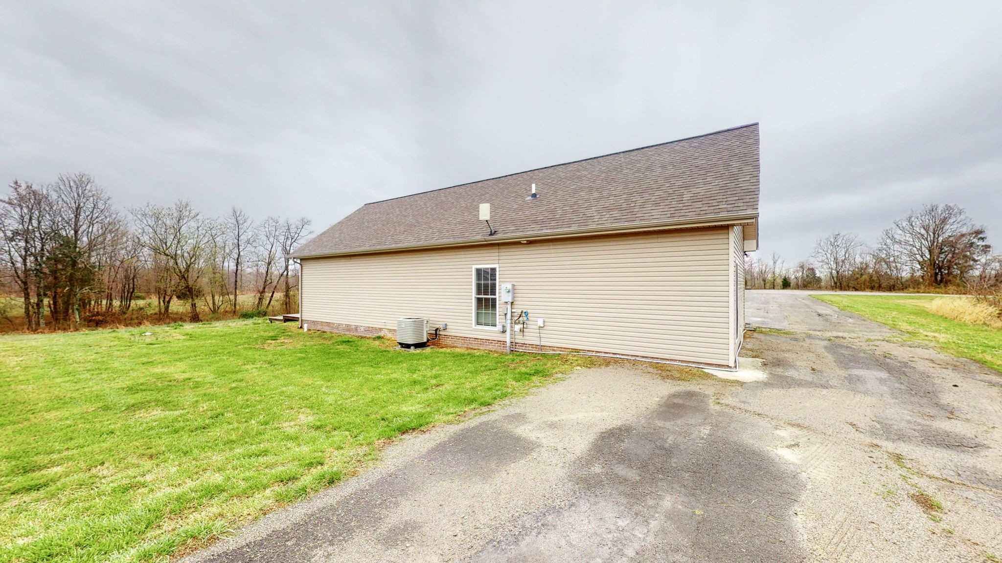5273 Zander Road Hopkinsville, KY 42240 - Photo 46 of 75 a front view of house with yard and trees