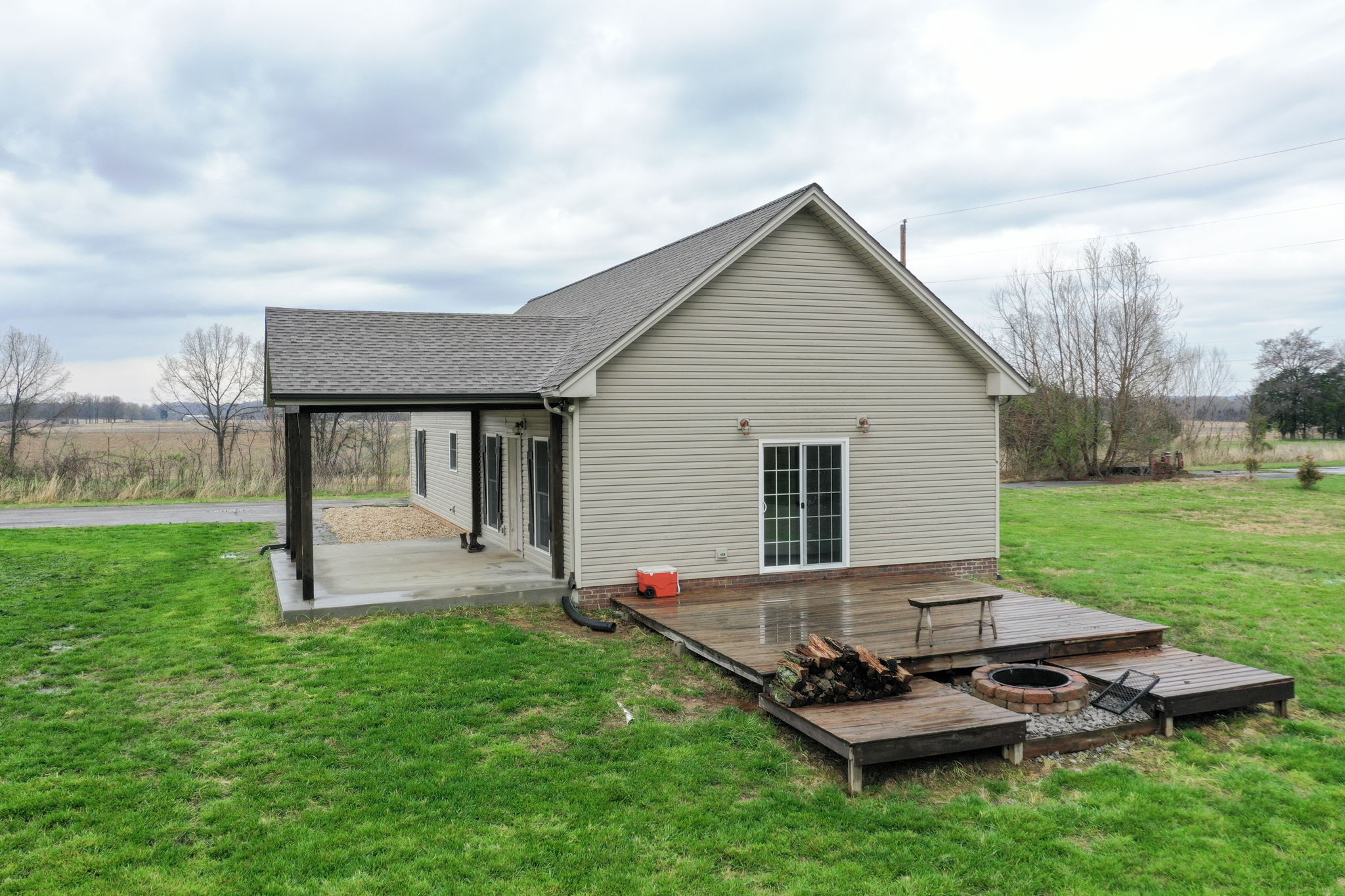5273 Zander Road Hopkinsville, KY 42240 - Photo 47 of 75 a backyard of a house with table and chairs