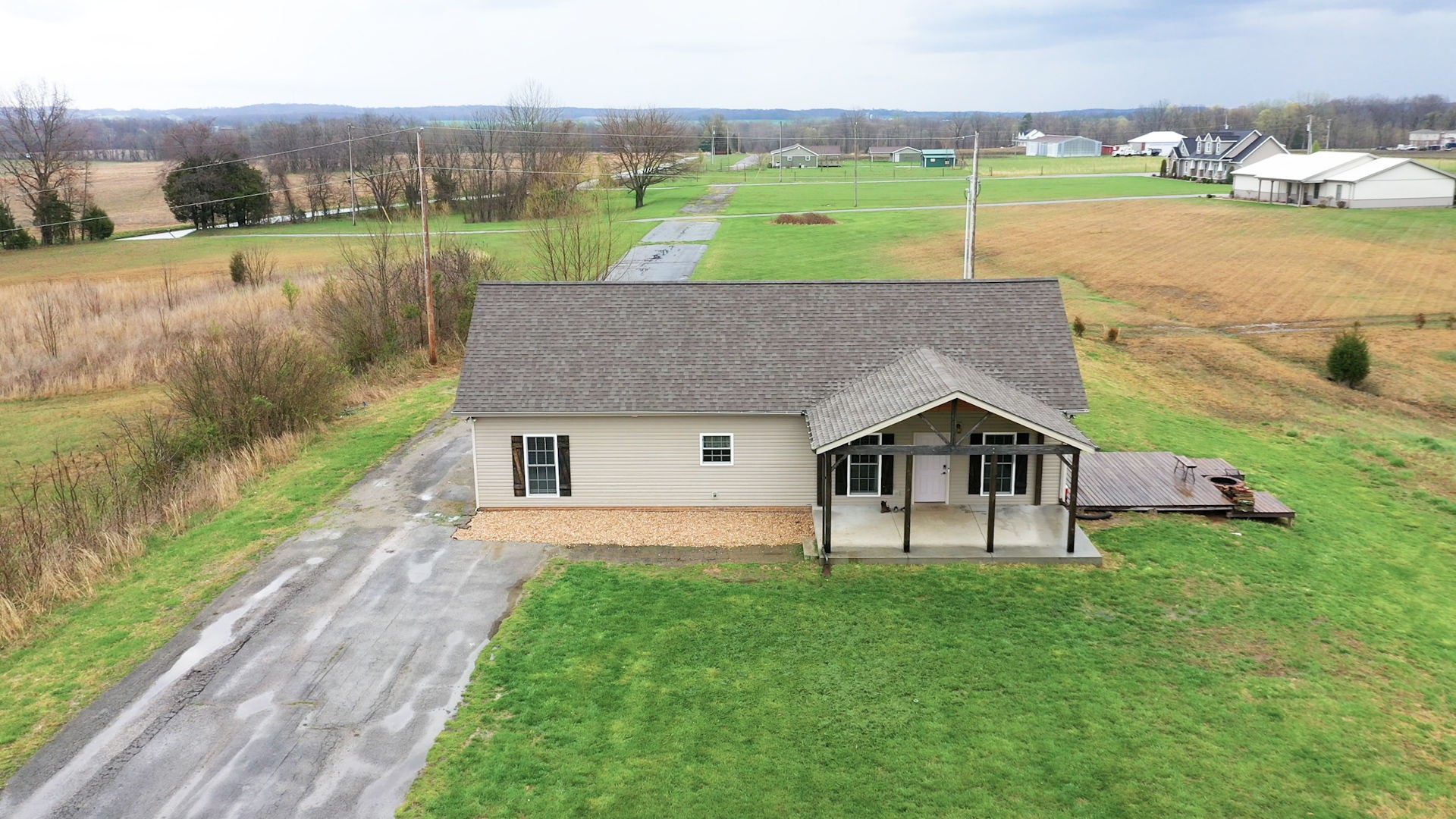 5273 Zander Road Hopkinsville, KY 42240 - Photo 54 of 75 a view of a house with a yard and lake view