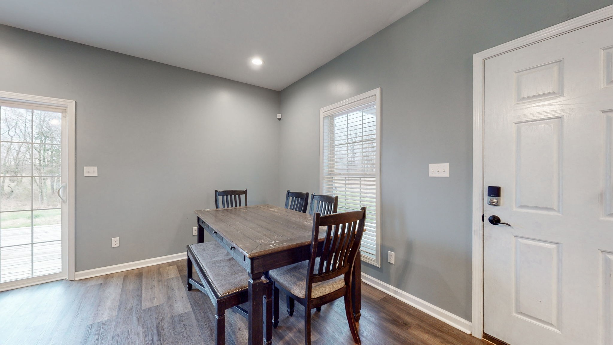 5273 Zander Road Hopkinsville, KY 42240 - Photo 10 of 75 a view of a dining room with furniture and wooden floor