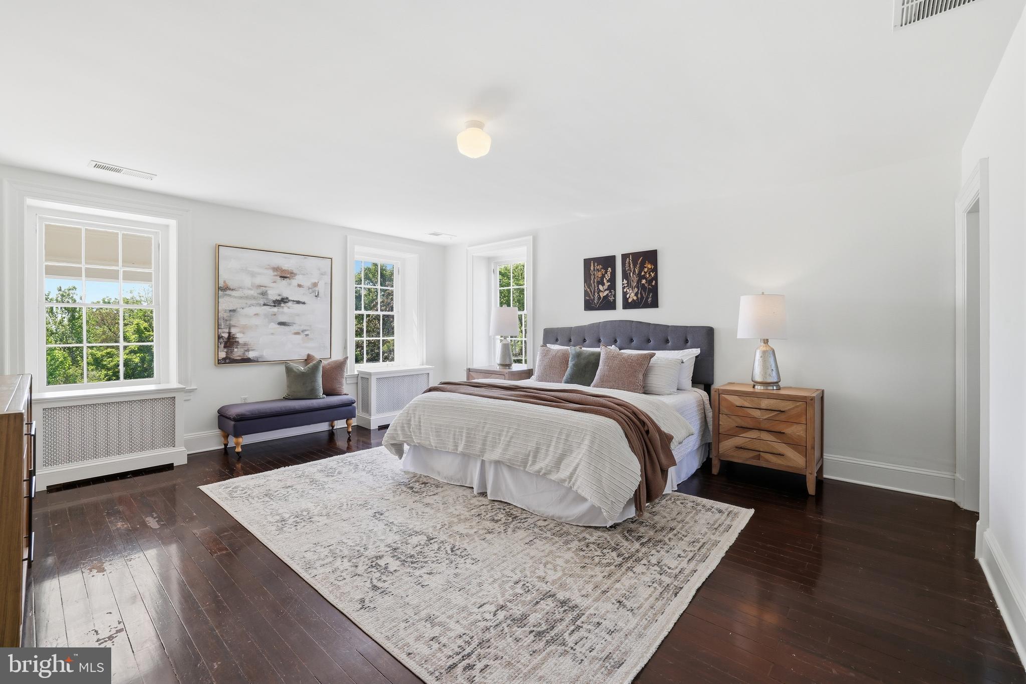 17781 Roxbury Hall Road Leesburg, VA 20175 - Photo 44 of 107 a bedroom with a bed and wooden floor