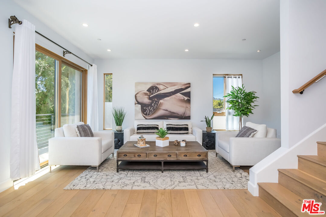 4531 Tujunga Avenue Studio City, CA 91602 - Photo 14 of 49 a living room with furniture and a flat screen tv