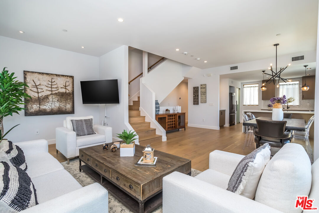4531 Tujunga Avenue Studio City, CA 91602 - Photo 16 of 49 a living room with furniture and a flat screen tv
