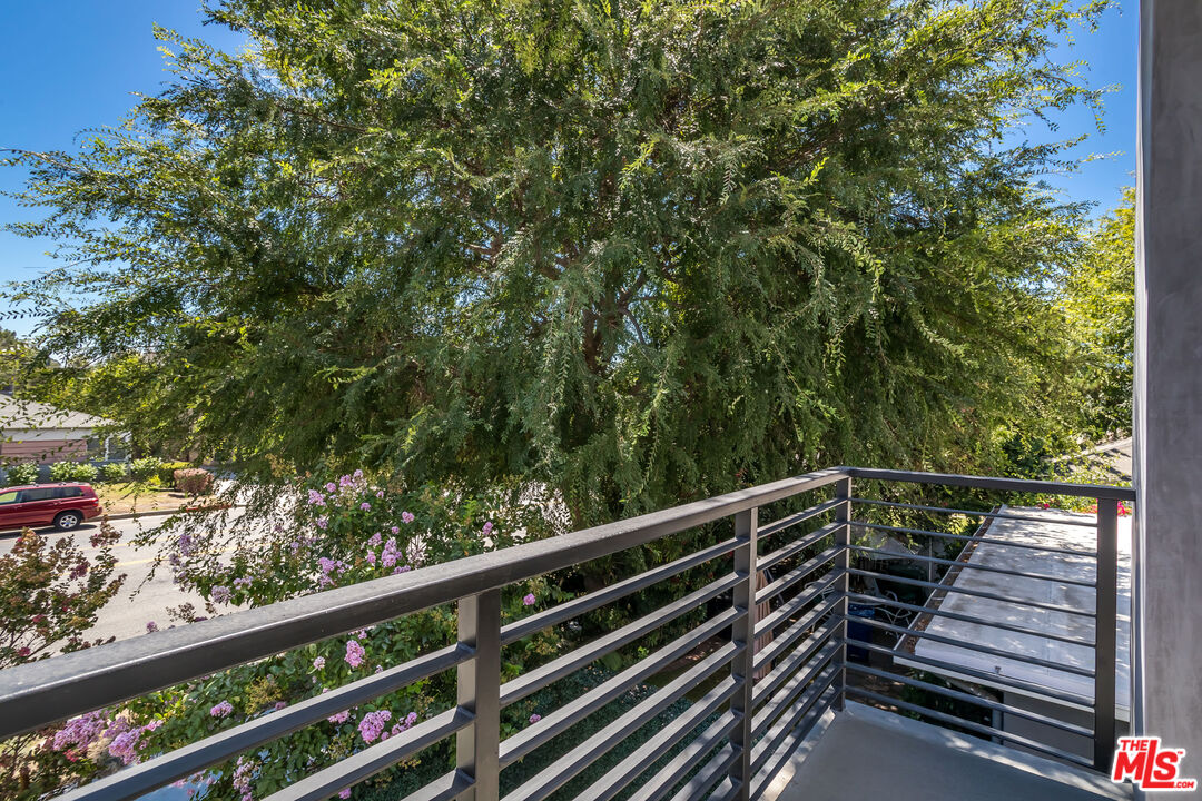 4531 Tujunga Avenue Studio City, CA 91602 - Photo 18 of 49 a view of balcony with wooden floor and fence
