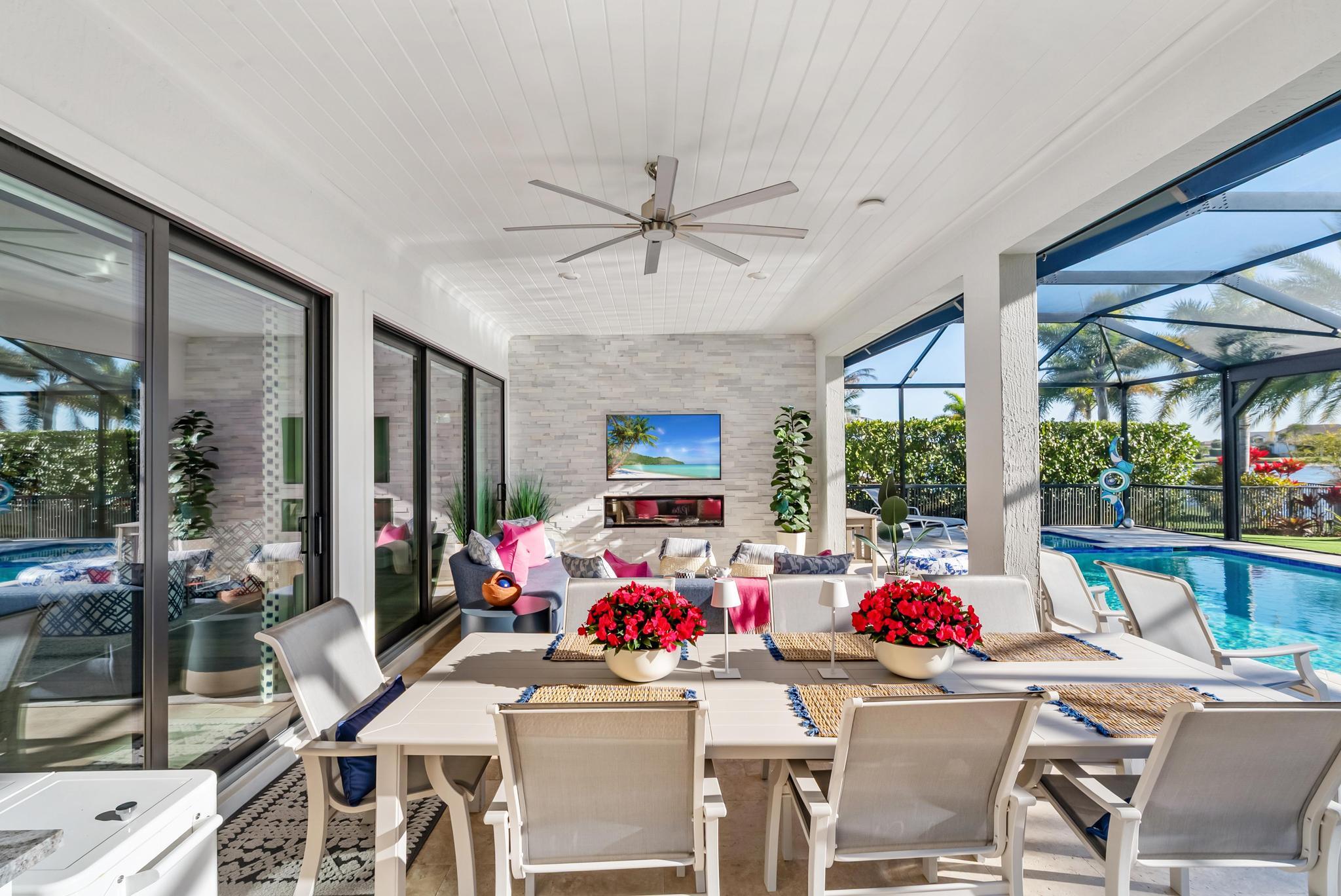 137 Cinder Dunes Point Jupiter, FL 33478 - Photo 26 of 45 a view of a dining room with furniture and a potted plant
