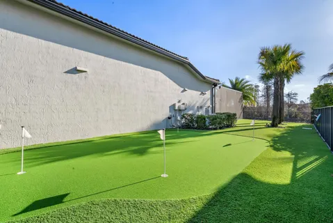 a view of a golf course with a garden