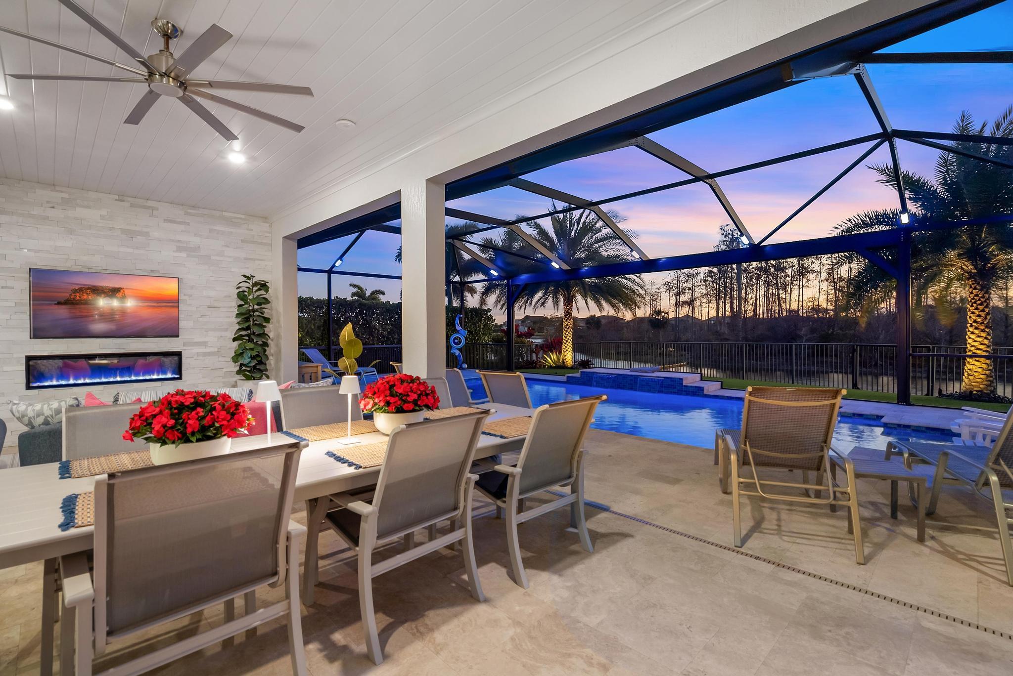 137 Cinder Dunes Point Jupiter, FL 33478 - Photo 33 of 45 a dining area with a table and chairs